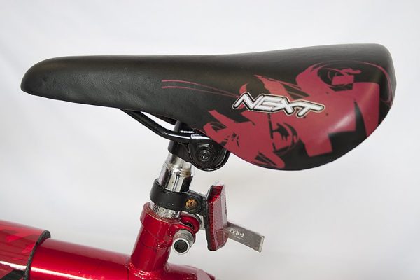 Child bike seat with quick release adjustment